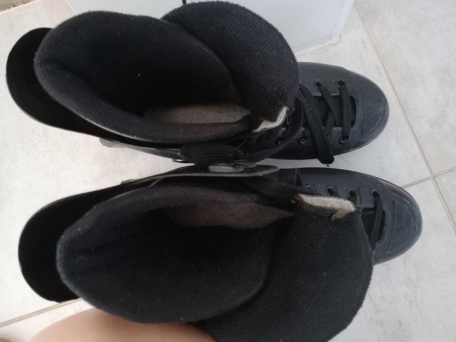 Patins em linha pretos