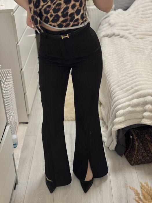 Брюки клеш з розрізом