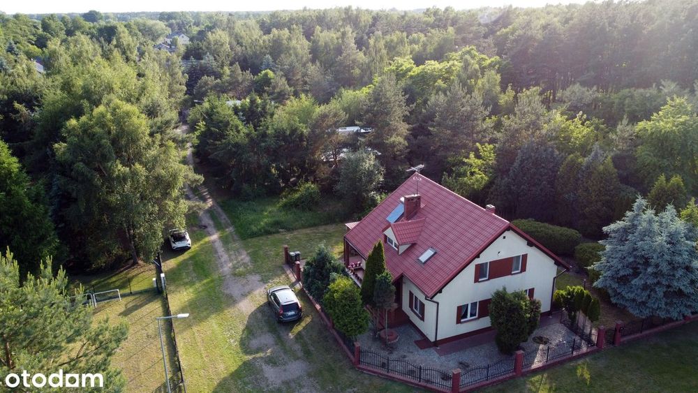Zamieszkaj przy lesie i nad jeziorem domu wolnostojącym