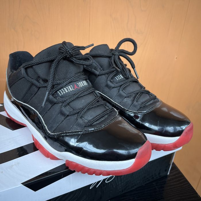 кроссовки Air Jordan 11 Retro Low «Bred».