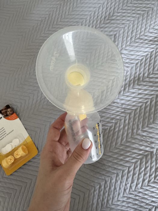 Medela swing електричний молоковідсмоктувач + клапани