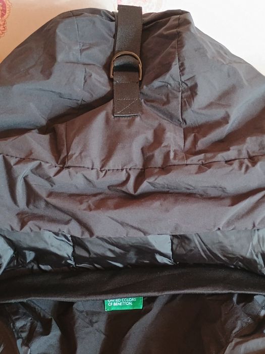 Женский пуховик черного цвета