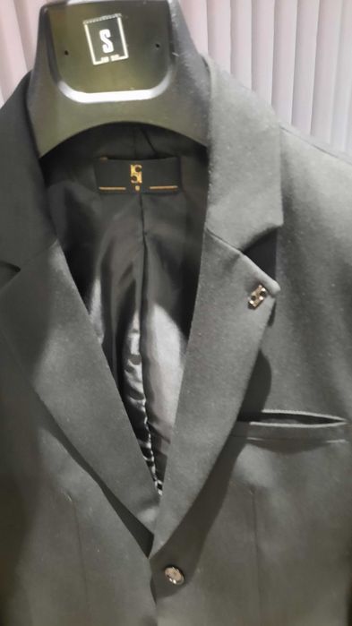 Fato de homem como novo