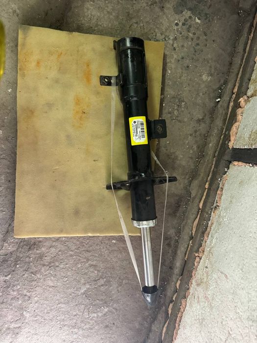 Стойка амортизатор левая Dodge Calibre