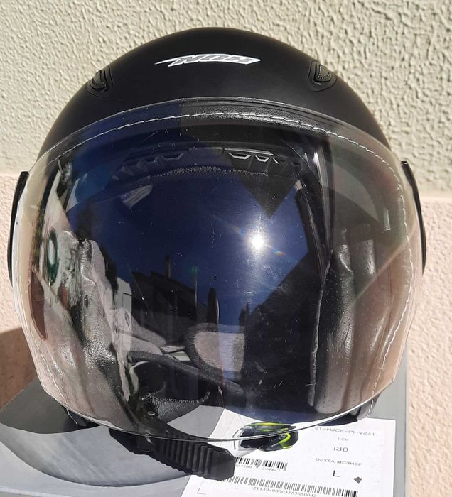 Capacete e casaco motard