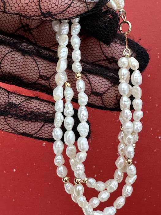 Браслет:річкові перли та золото 585