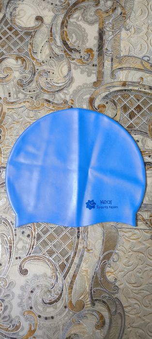 Шапочка для плавання для дитини.