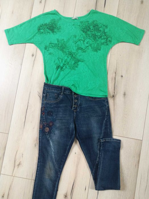 Damskie spodnie boyfrend z denimu z haftem na biodrze