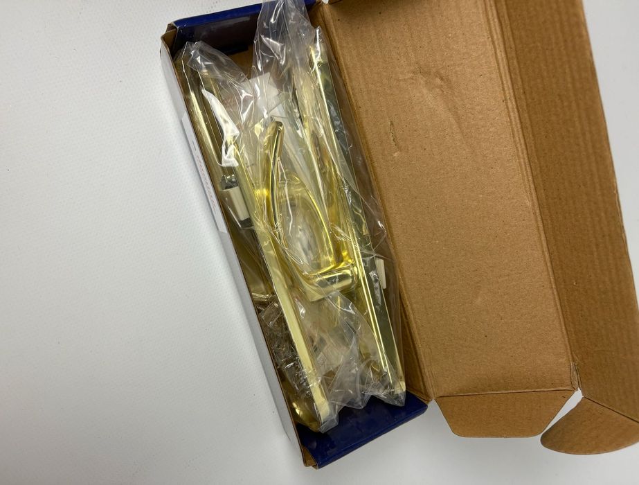 nowa złota klamka mosiądz domino nova