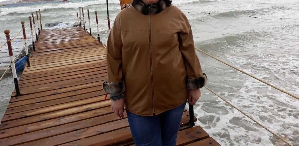 Шкіряна двостороння куртка з хутром, майже нова