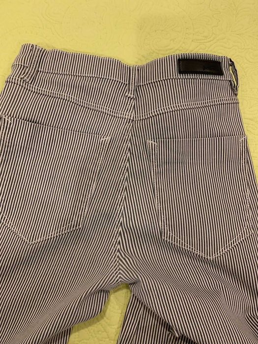 Calças riscas Stradivarius