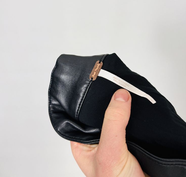 Czarna skórzana mini spódnica z guzikami S 36