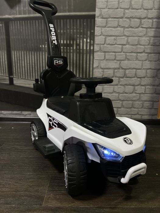 Каталка Bambi Racer 2в1 с музыкой и светом Белый