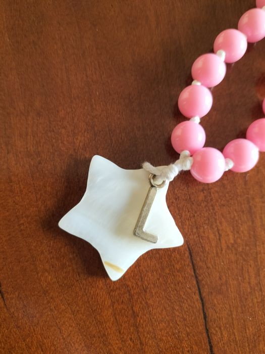Fio pérolas rosa com estrela branca