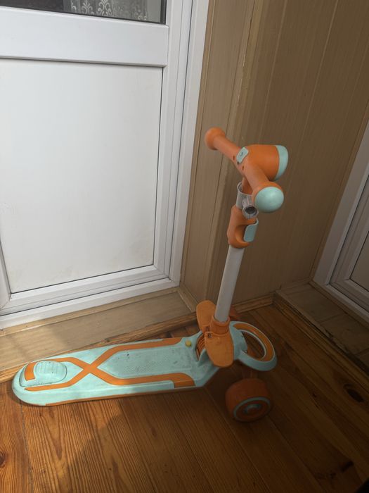 Самокат с ролительской ручкой