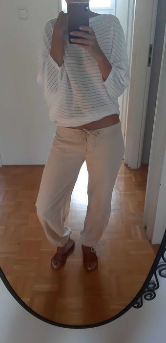 Lniane kremowe spodnie Terranova na lato