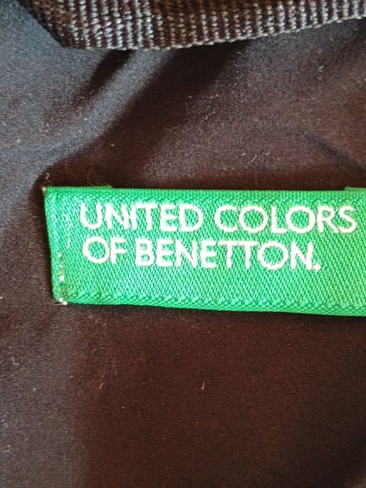 Женский пуховик черного цвета