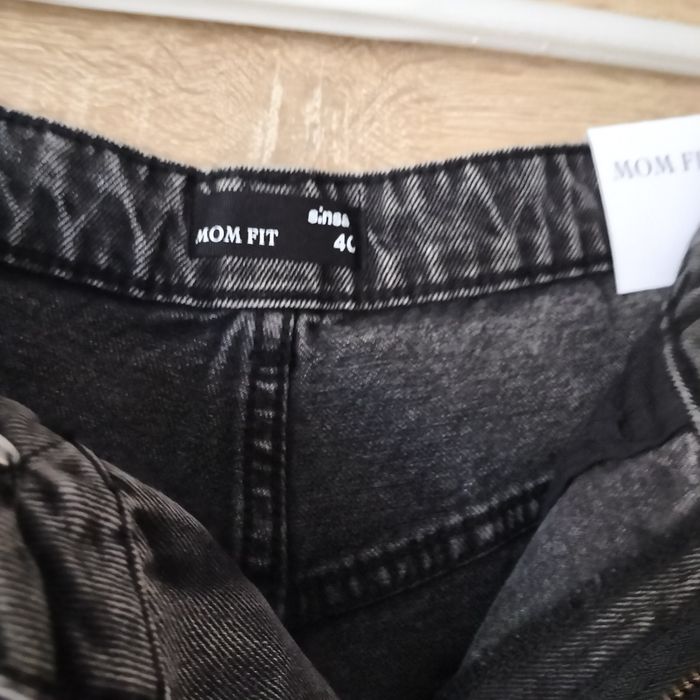 Nowe damskie spodnie jeans roz L Sinsay