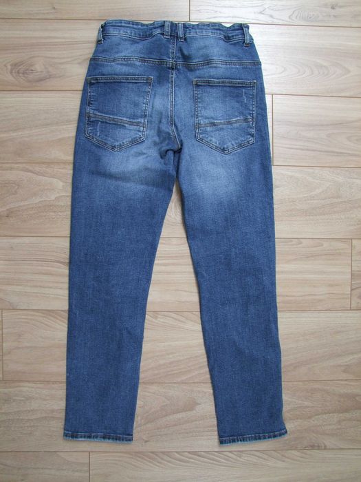 Spodnie Reserved roz. 152
