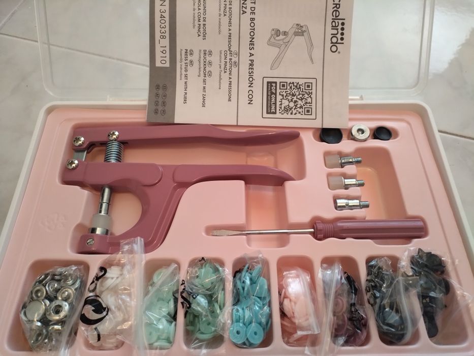 Pistola para botões de mola