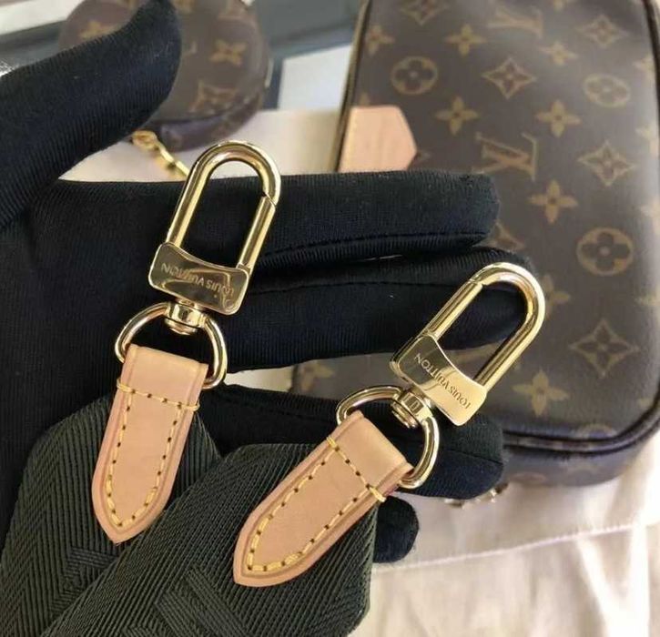 Bolsa multiacessórios Louis Vuitton