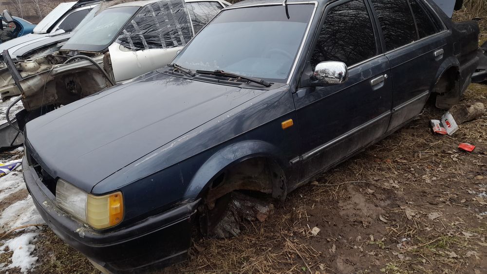 КПП  Мазда 323 1.5 бензин