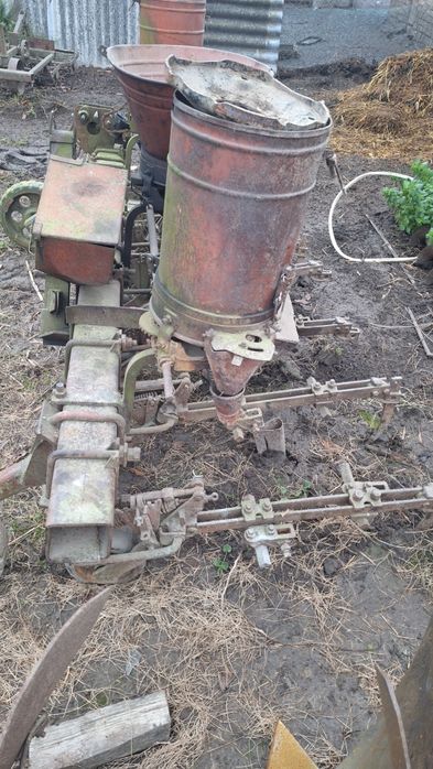 Міжрядний підживлювач до трактора