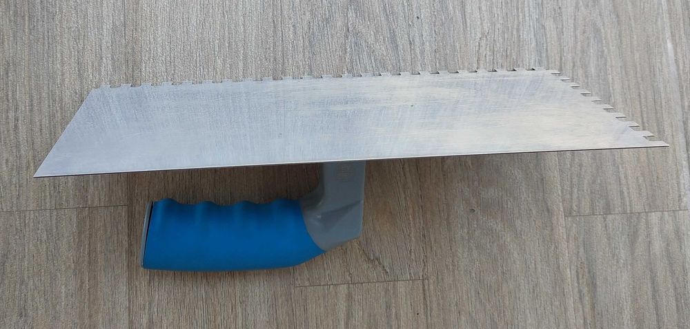 Гладилка з нержавіючої сталі 120x280 мм .