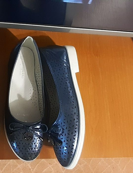 Нові туфлі мокасини