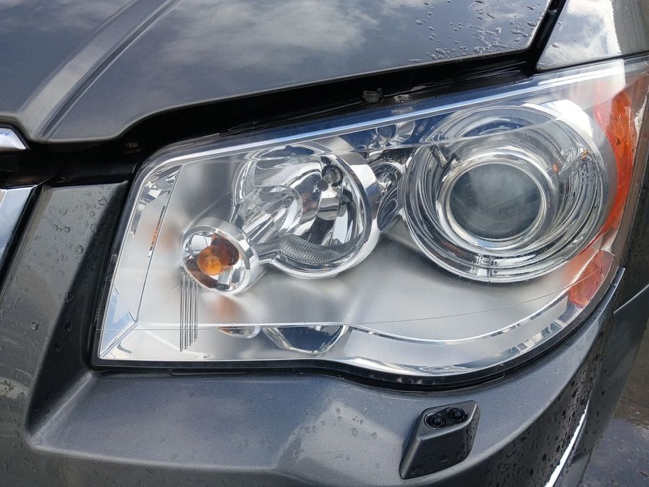 Ótica / farol esquerda CHRYSLER Grand Voyager V (RT)