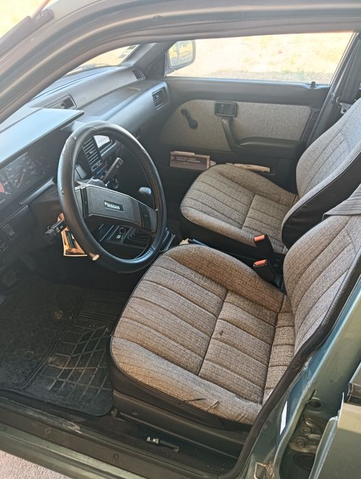Nissan Sunny — fotografia 4