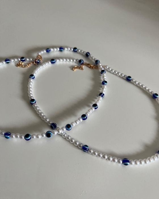 Colar olho turco e perolas