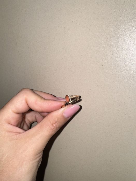 Золоте кільце cartier