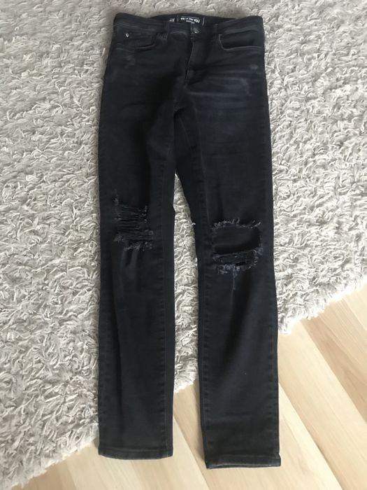 Jeansy  damskie, czarne z rozdarciami r. M z H&M
