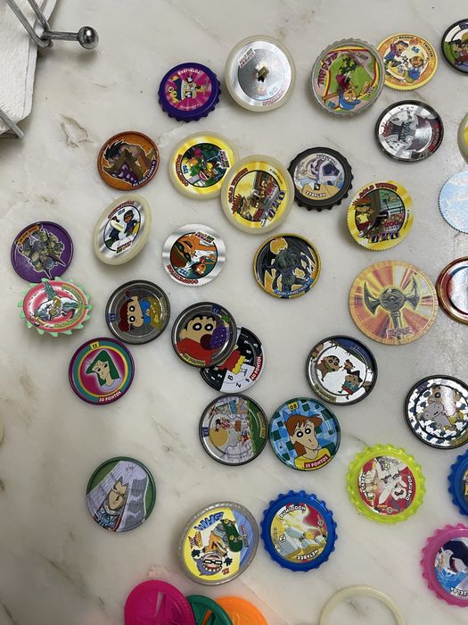 Comjunto de variadoa tazos e aceasorios