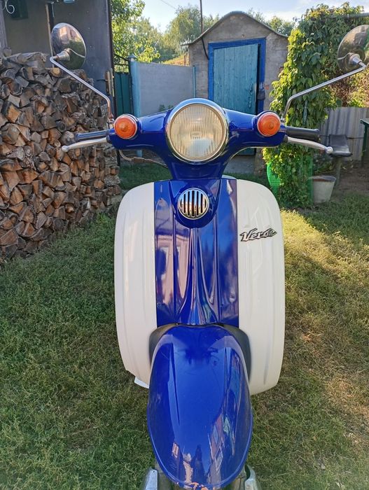 Скутер  Сузукі верде