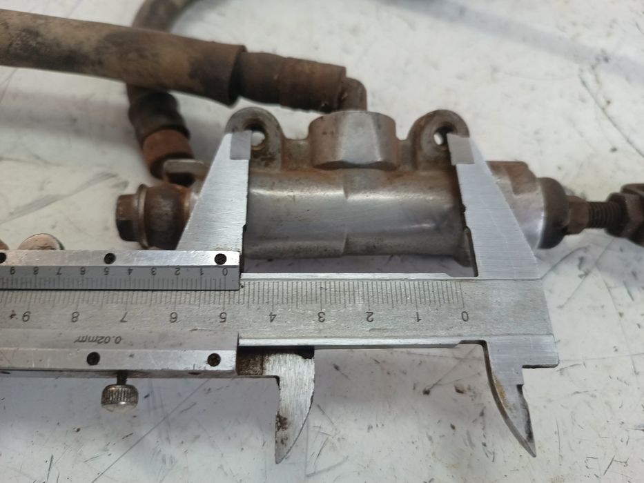Zacisk hamulcowy tył tylny pompa hamulcowa tył Suzuki RM 125 / 250 95r