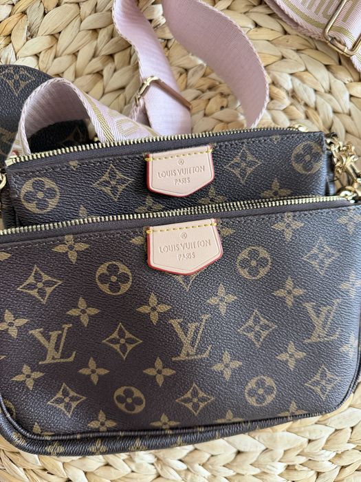 Mala Louis Vuitton com alça rosa