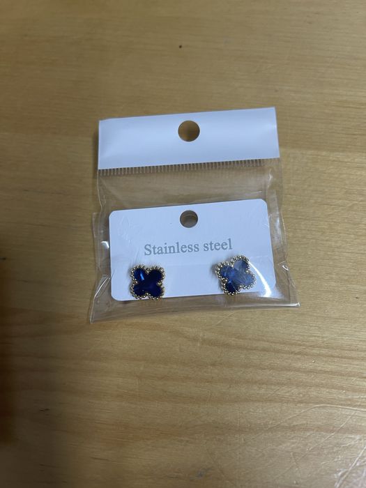 Brincos trevo dourados