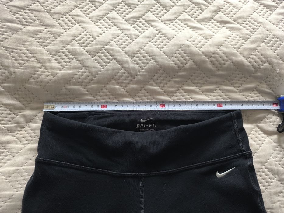 Czarne legginsy sportowe Nike