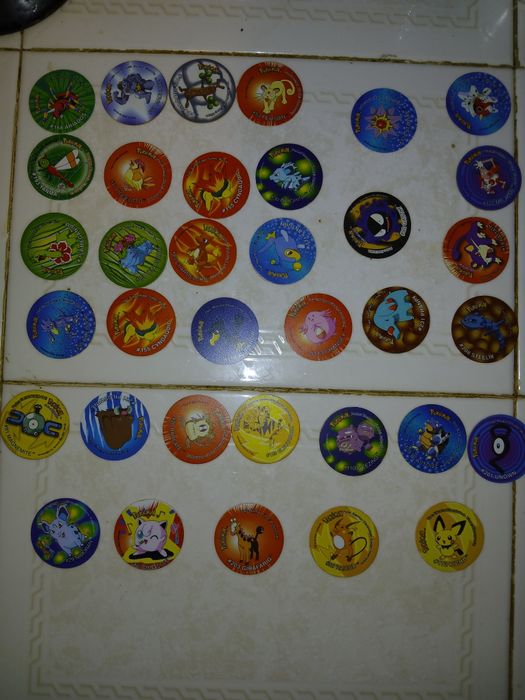 Caderneta pokemon com tazos
