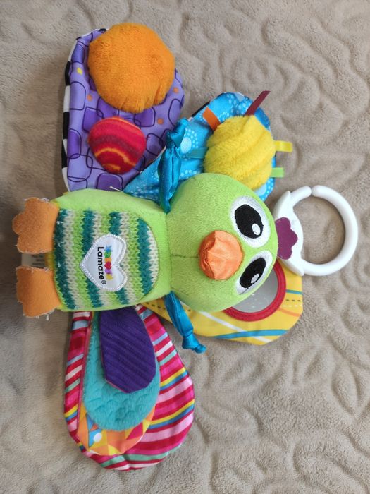 Продам іграшку підвіску Павич з пищалкою Lamaze