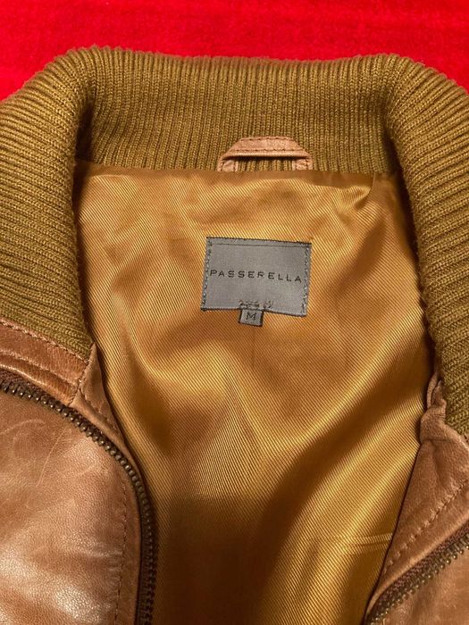 Blusão de senhora, em pele.