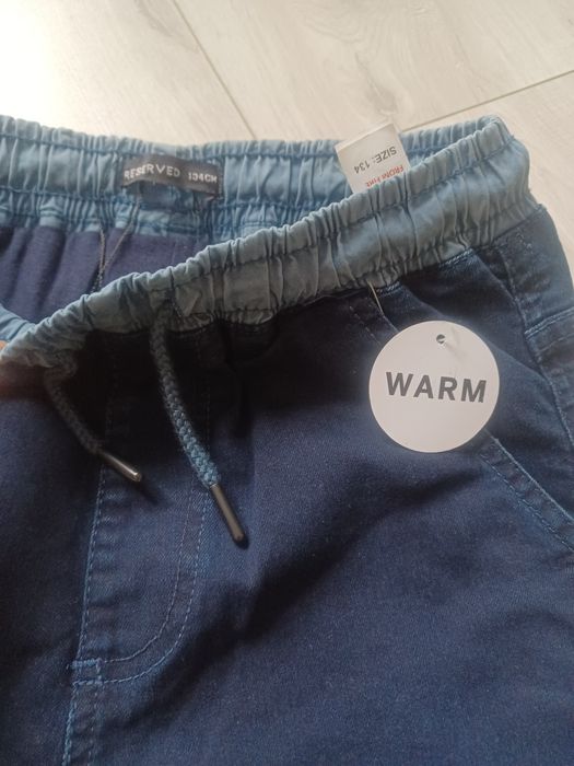 Nowe spodnie jeansowe reserved