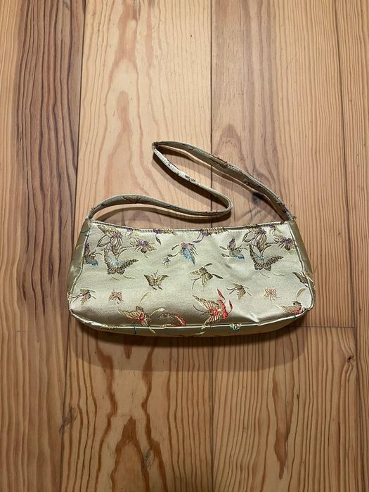 Bolsa pequena com figuras