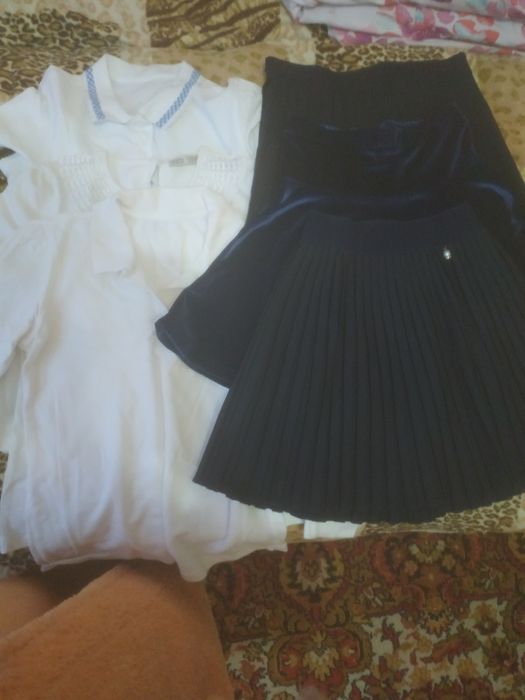Отдам школьные юбки и кофты на девочку