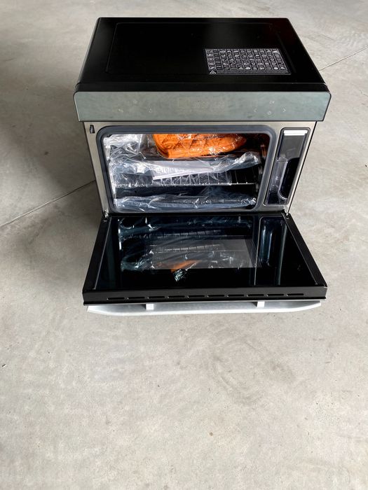 Forno elétrico da marca Trisa, capaz de cozer a vapor NOVO