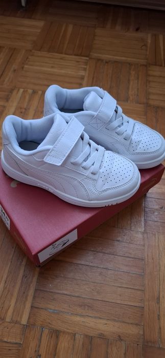 Дитячі білі кросівки Puma