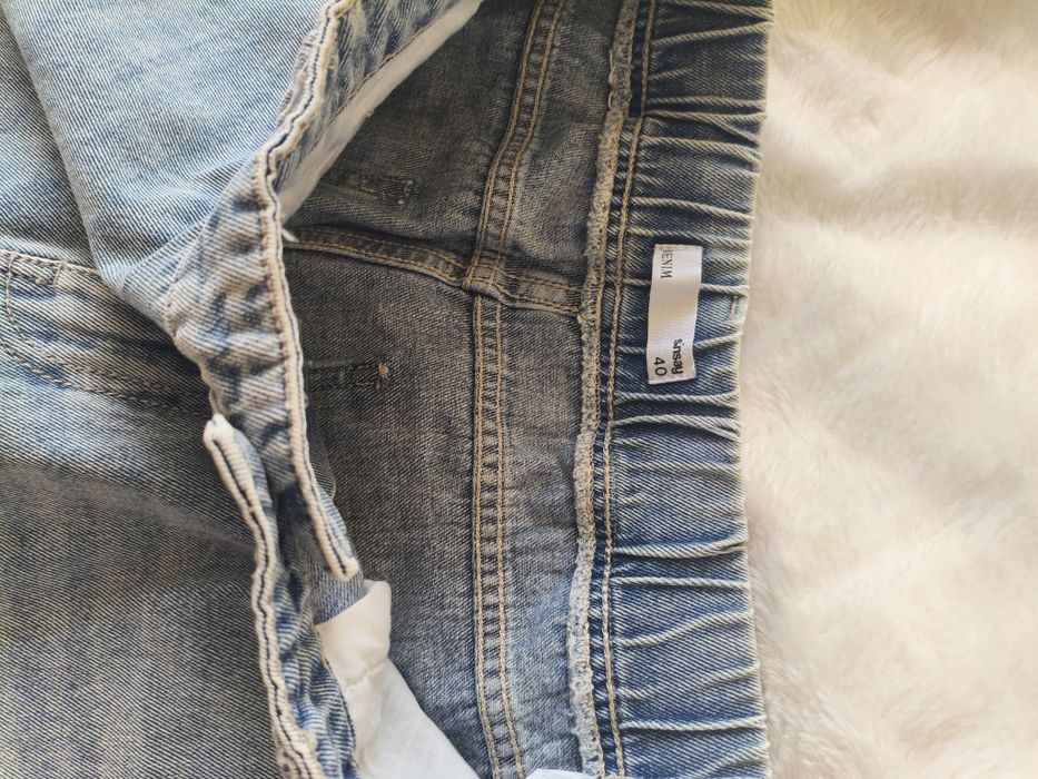 Spodnie jeansy nowe bez metki Sinsay M/L.