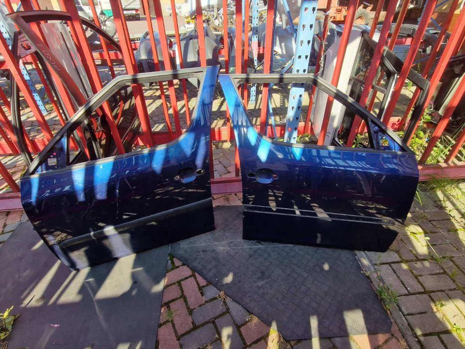 Дверь передняя Шкода Румстер 2006-2015